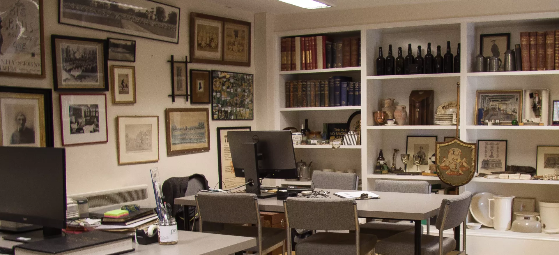 An image of the Trinity College Archive reading room, with ephemera displayed on the walls.