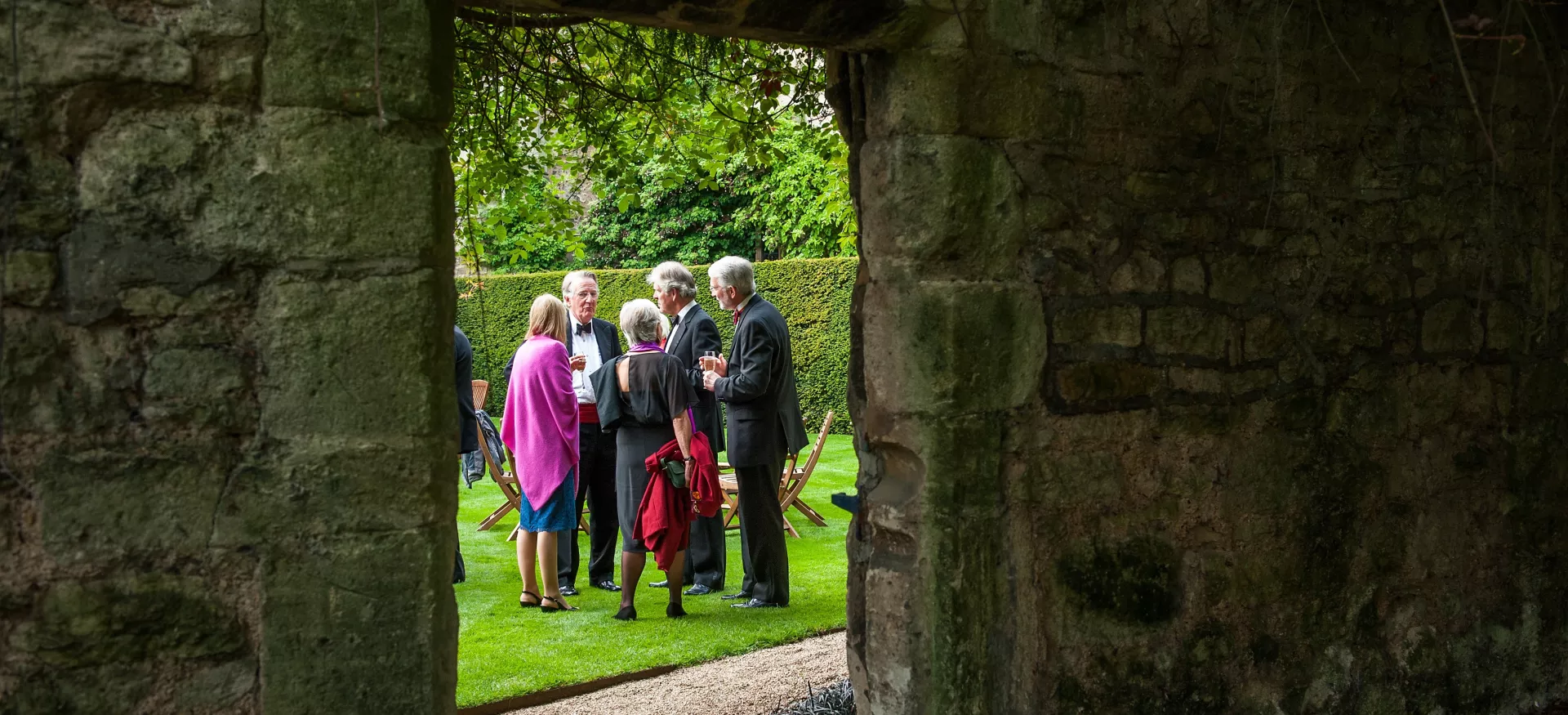 Group of people standing in President's garden