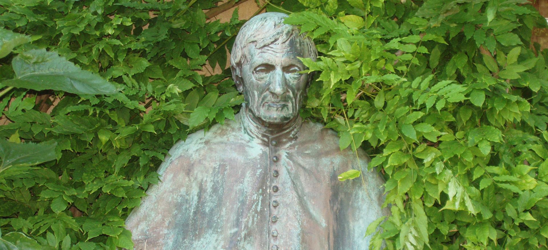 A bust of John Henry Newman sits in Trinity's Garden Quad.