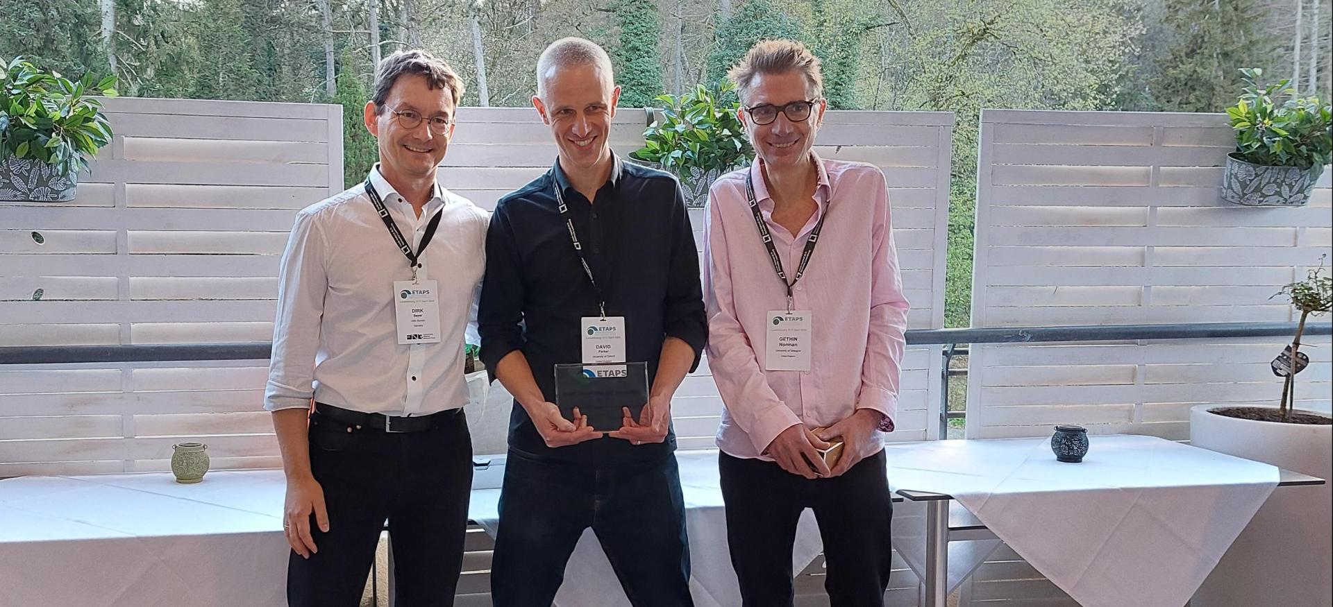Trinity tutorial fellow David Parker and two colleagues hold the ETAPS Test of Time Award.
