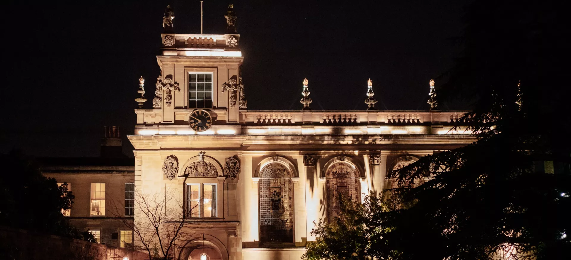The chapel of Trinity college at night.