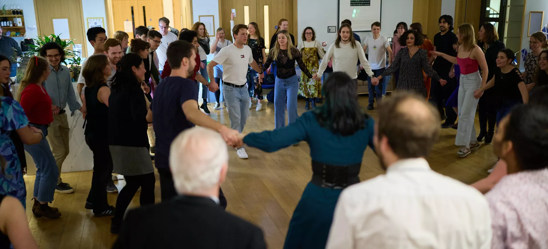 The Trinity cafe full of MCR members during their Burns Night ceilidh dancing event.