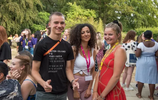 Three students on Oxford's UNIQ summer school smile for the camera.