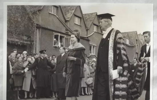 Queen Elizabeth stands with university chancellor Harold Macmillan outside Trinity college in 1960.