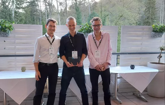 Trinity tutorial fellow David Parker and two colleagues hold the ETAPS Test of Time Award.