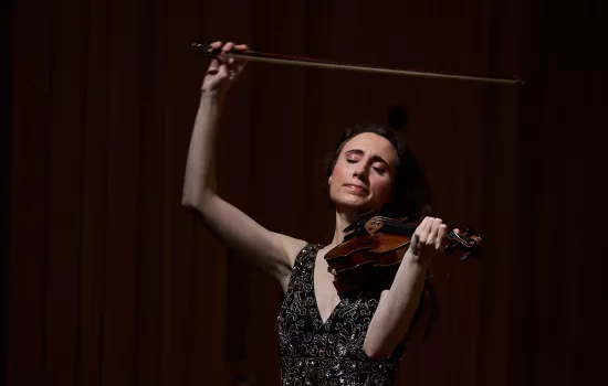 Jennifer Pike plays the violin with a flourish.