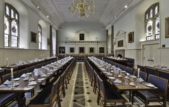 the newly restored Trinity dining hall set for a formal meal.