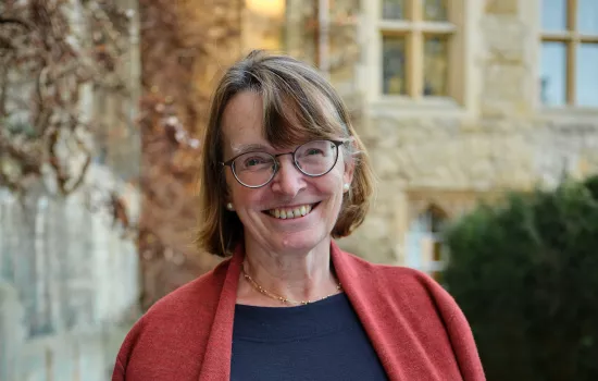 Hilary Boulding stands outside the President's Lodgings at Trinity.