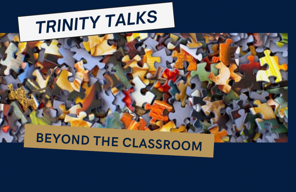 An image of jigsaw puzzle pieces against a dark blue background with the words "Trinity Talks: Beyond the Classroom" superimposed.