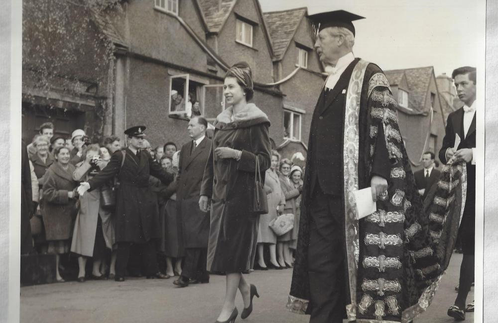 Queen Elizath stands with university chancellor Harold Macmillan outside Trinity college in 1960.