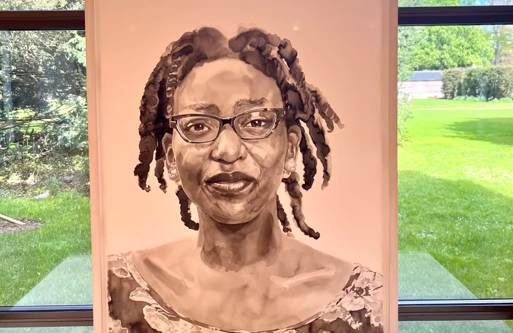 An artist's portrait of Kome Gbinigie, a member of the PRINCIPLE PANORAMIC team. 