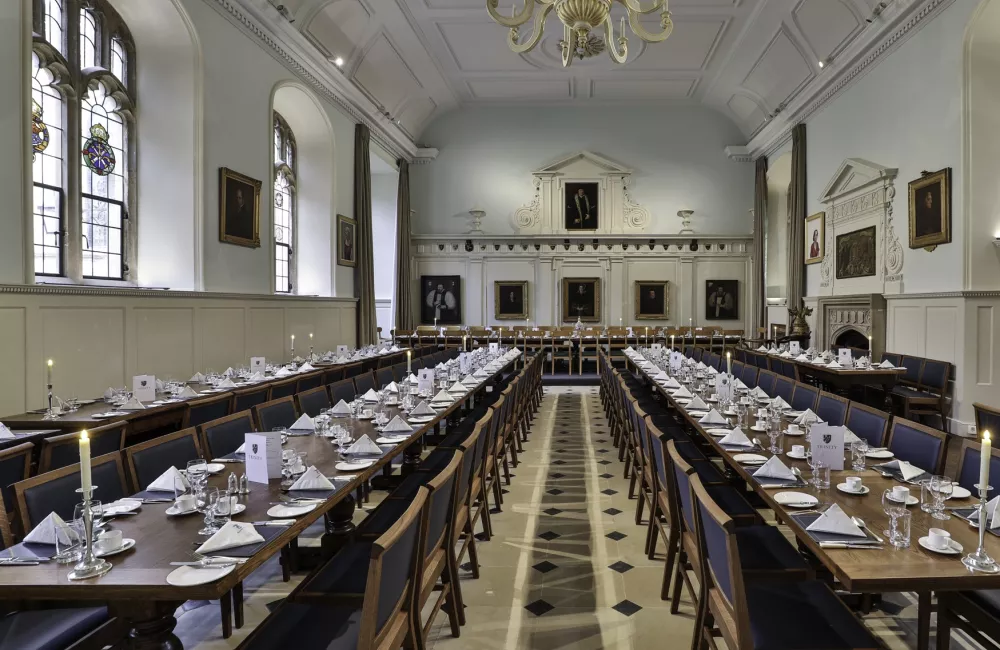 The restored Trinity dining hall set for a formal banquet.