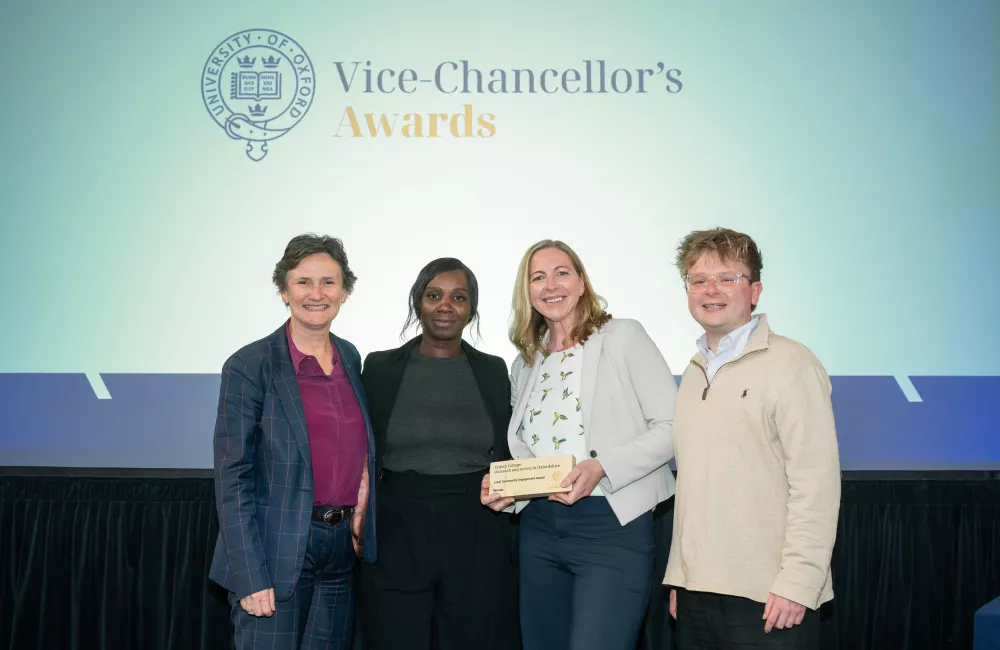 Trinity Access team members Hannah Rolley, Innocen Otunnu and Rob Harrison stand with Oxford's Vice-Chancellor, Irene Tracey.