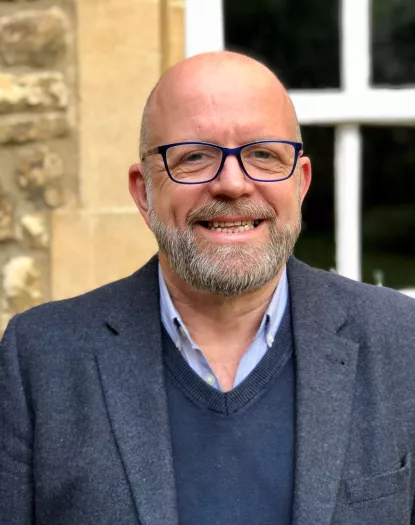 Trinity SCR Steward Jonathan Flint stands smiling.