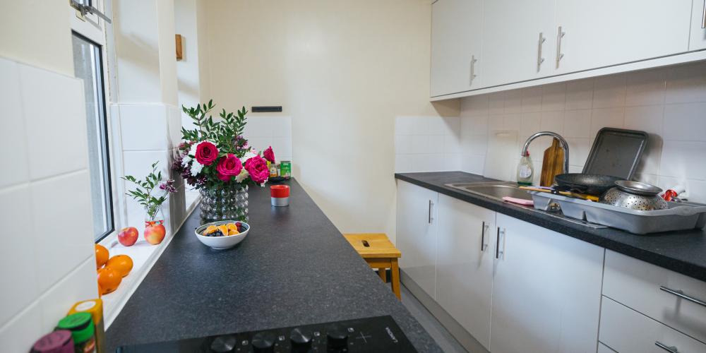 A shared kitchen area in Trinity's offsite Rawlinson Road property.