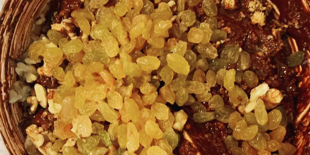 The chocolate mixture with fruit mixed in.