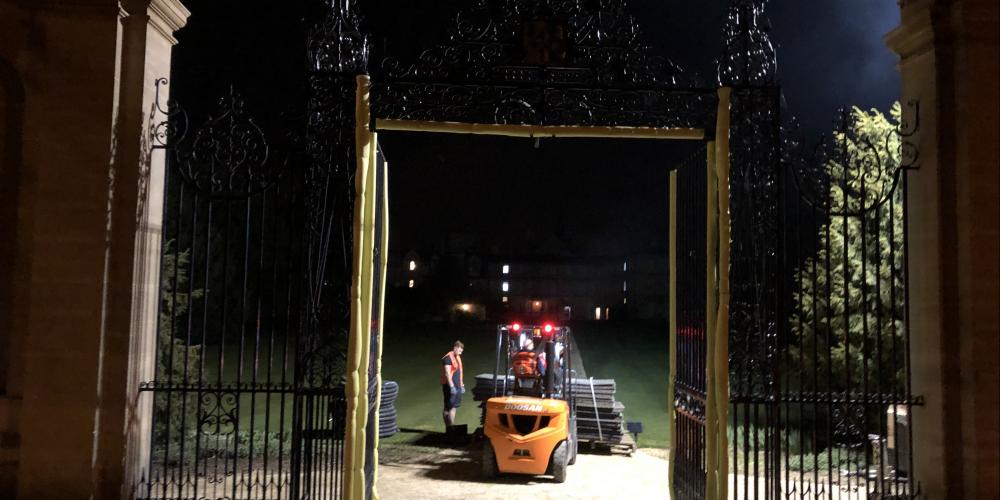 A forklift truck drives through the open space where the Stuart Gates used to be.