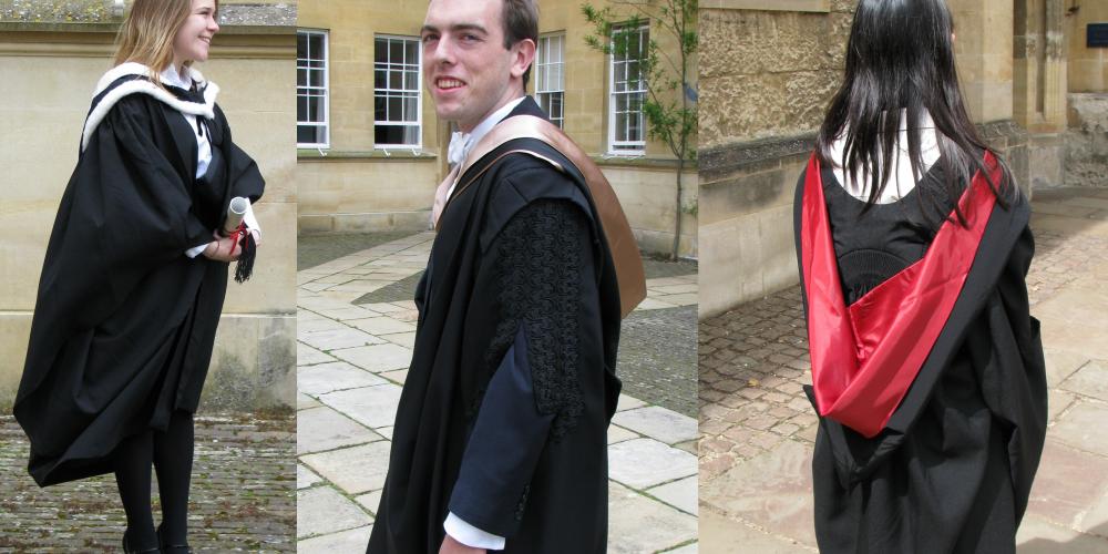 Students wearing different gowns