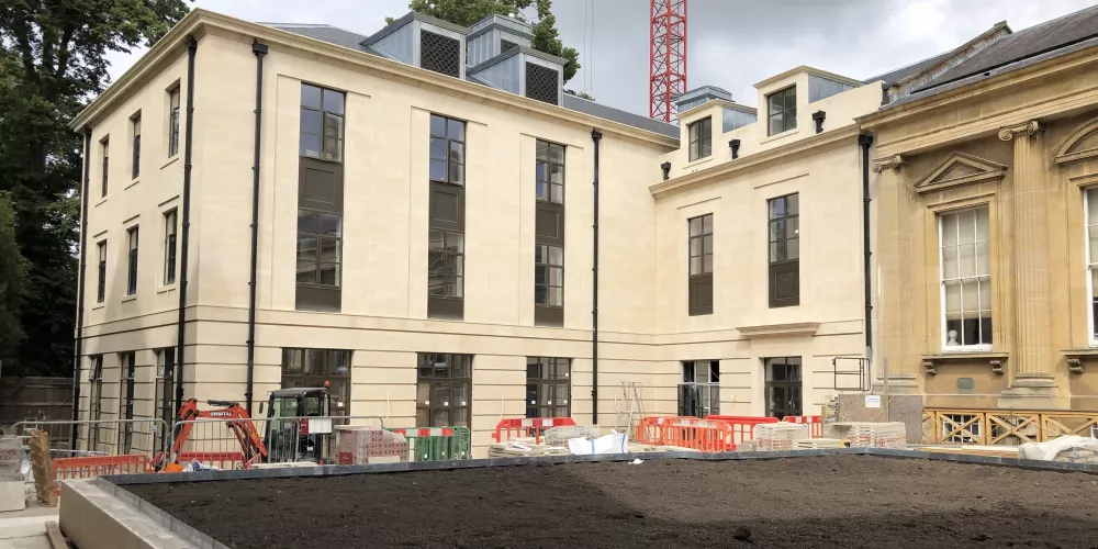 A view of the Levine Building and raised garden bed.