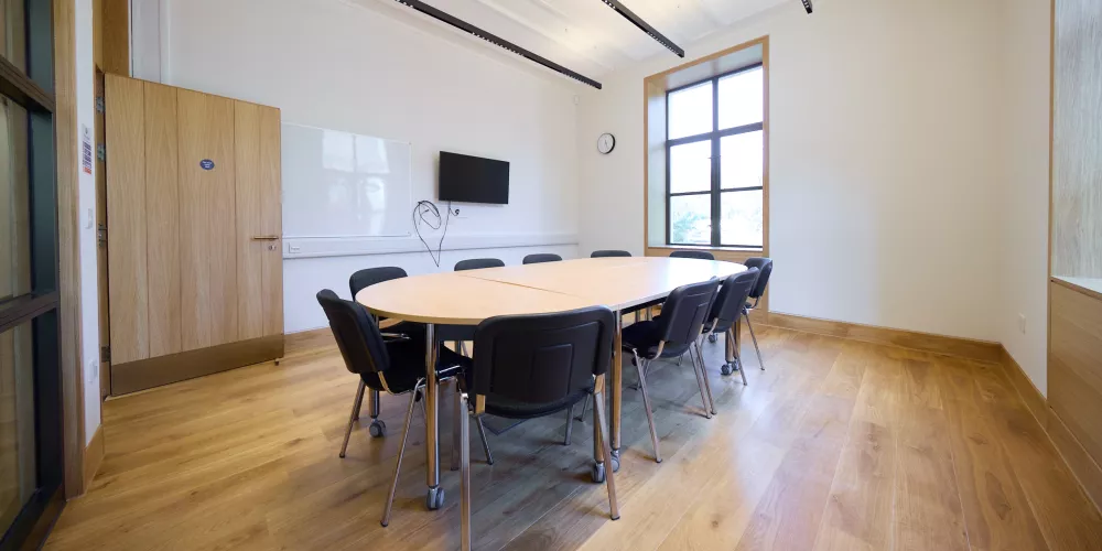 Levine Building Meeting Room 3 set up boardroom style.