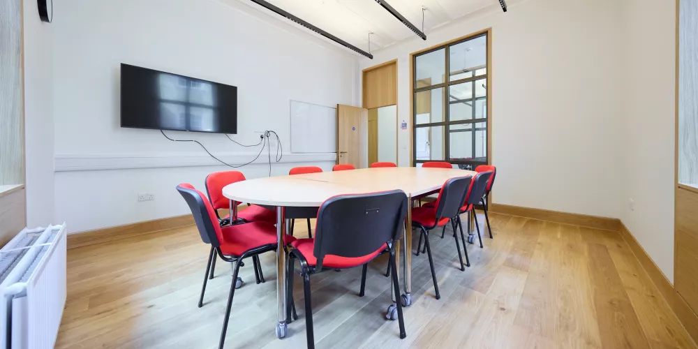 Levine Building Meeting Room 4 set up boardroom style.