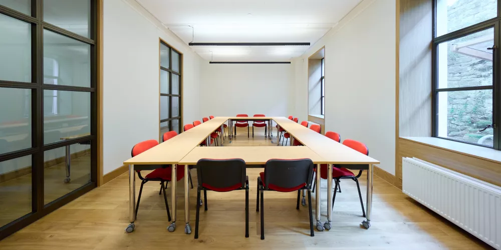 Levine Building Meeting Room 5 set up boardroom style.