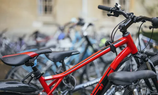A close-up of bicycles parked in Trinity college.
