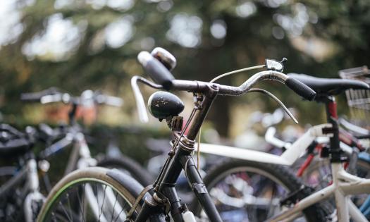 A close-up of bicycles parked in Trinity college.