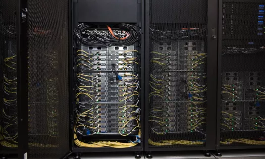 The back of Oxford University's supercomputer with wiring.
