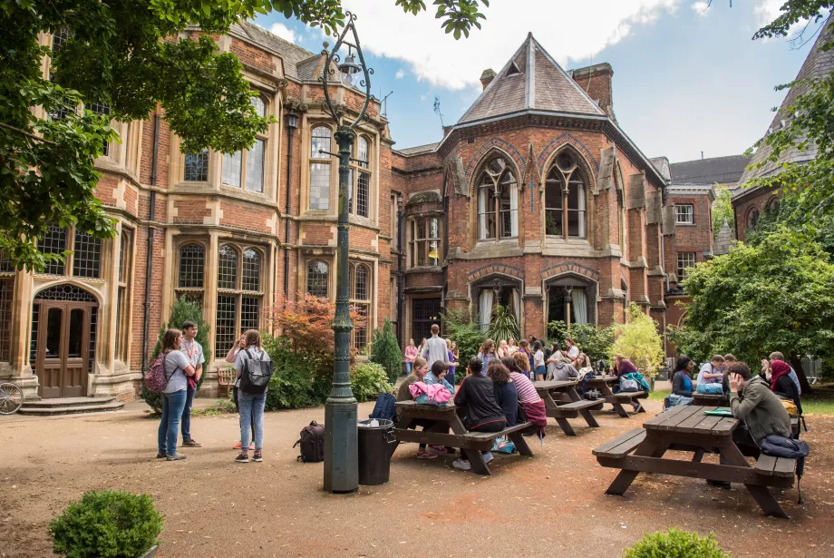 Students socialising outside in the garden area of the Oxford Union.