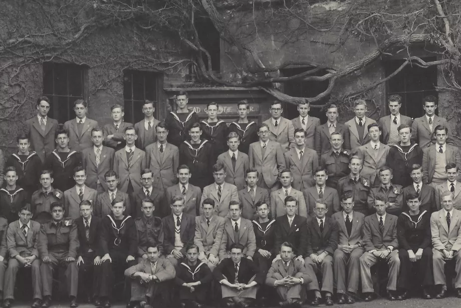 A black and white photo of Trinity College freshers from 1943.