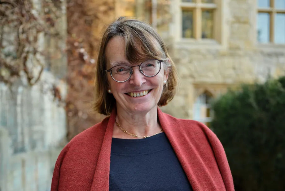 Hilary Boulding stands outside the President's Lodgings at Trinity.